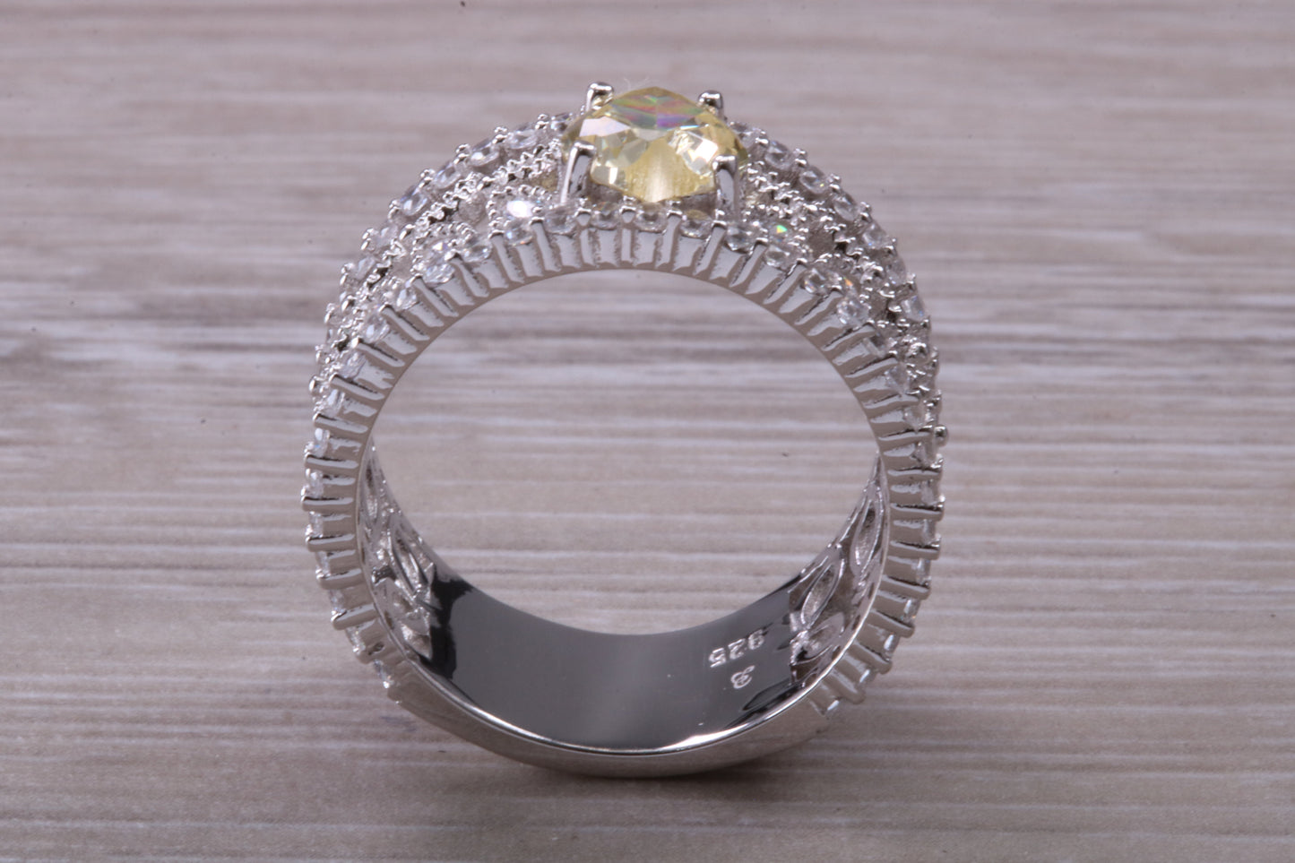 Beautiful and absolutely stunning ring, set with top grade Diamond White and Yellow C Z, Rhodium plated