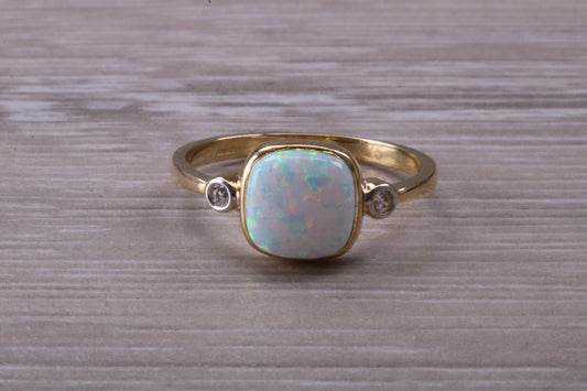 Opal and Diamond White Cubic Zirconia set Trilogy ring, solid 9ct Yellow Gold, very fiery oval cut Cultured Opal