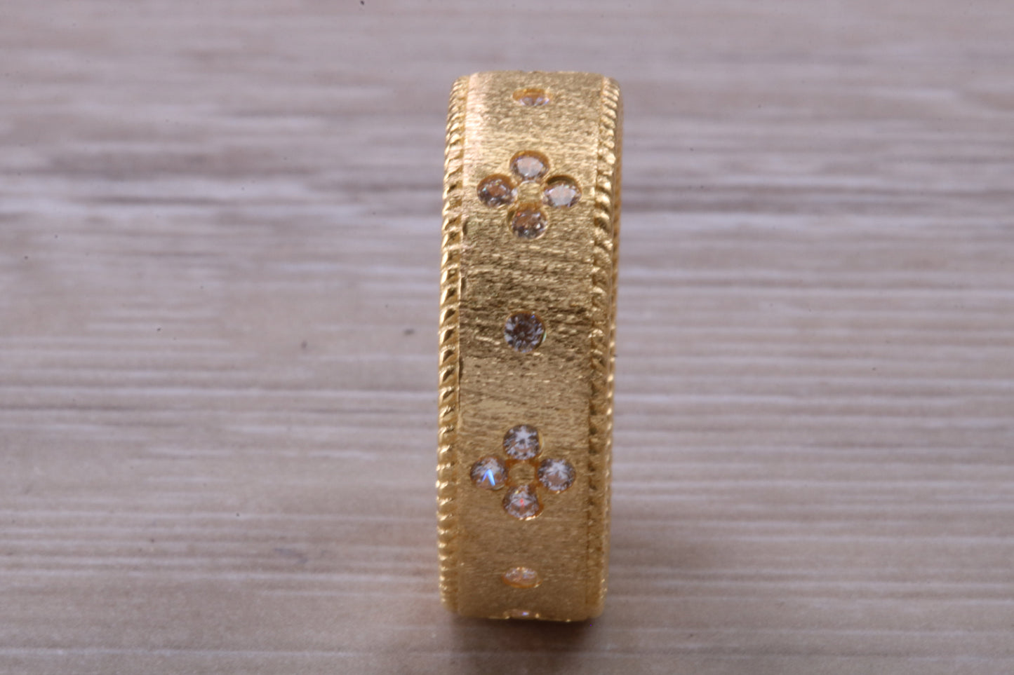 Sterling Silver 7 mm wide band, 18ct Yellow Gold plated and set with Diamond White C Z