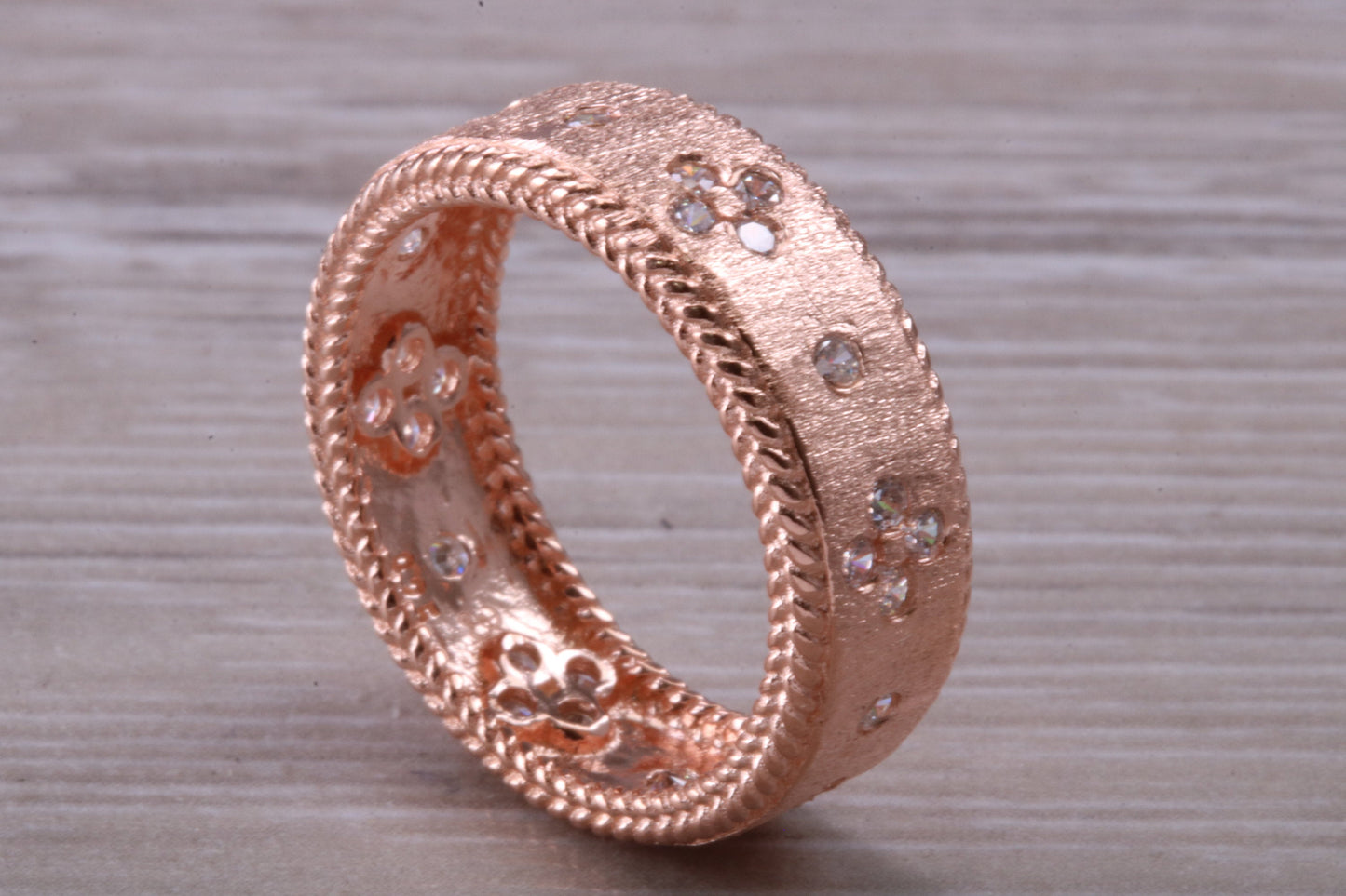 Sterling Silver Rose Gold 7 mm wide band, 18ct Rose Gold plated and set with Diamond White C Z