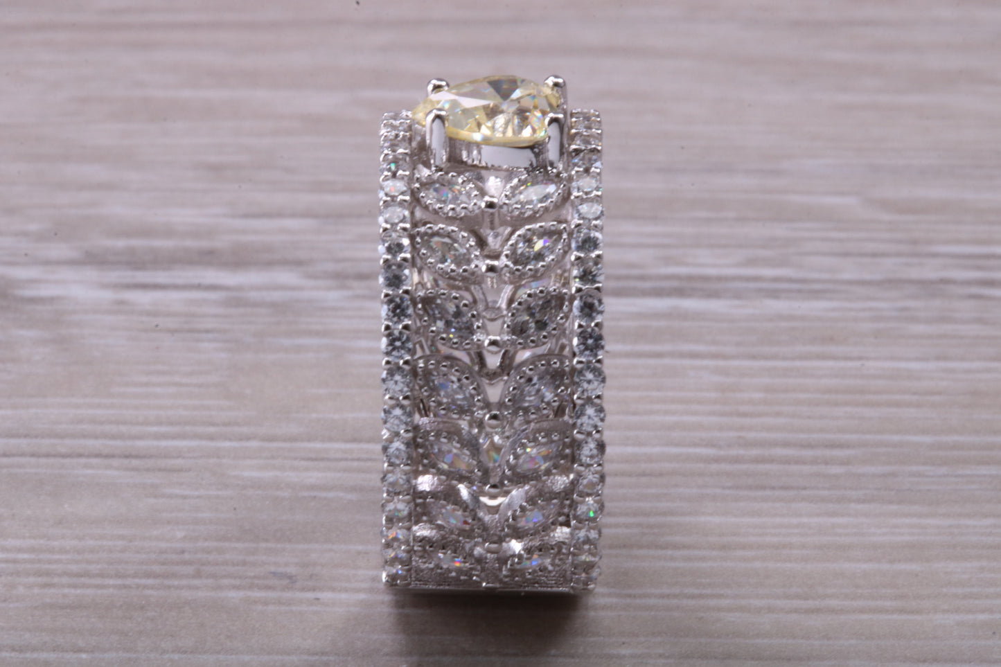Beautiful and absolutely stunning ring, set with top grade Diamond White and Yellow C Z, Rhodium plated