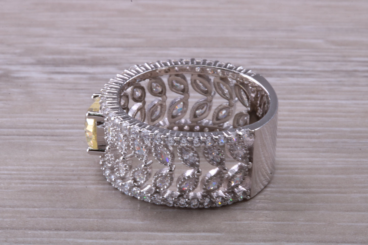 Beautiful and absolutely stunning ring, set with top grade Diamond White and Yellow C Z, Rhodium plated