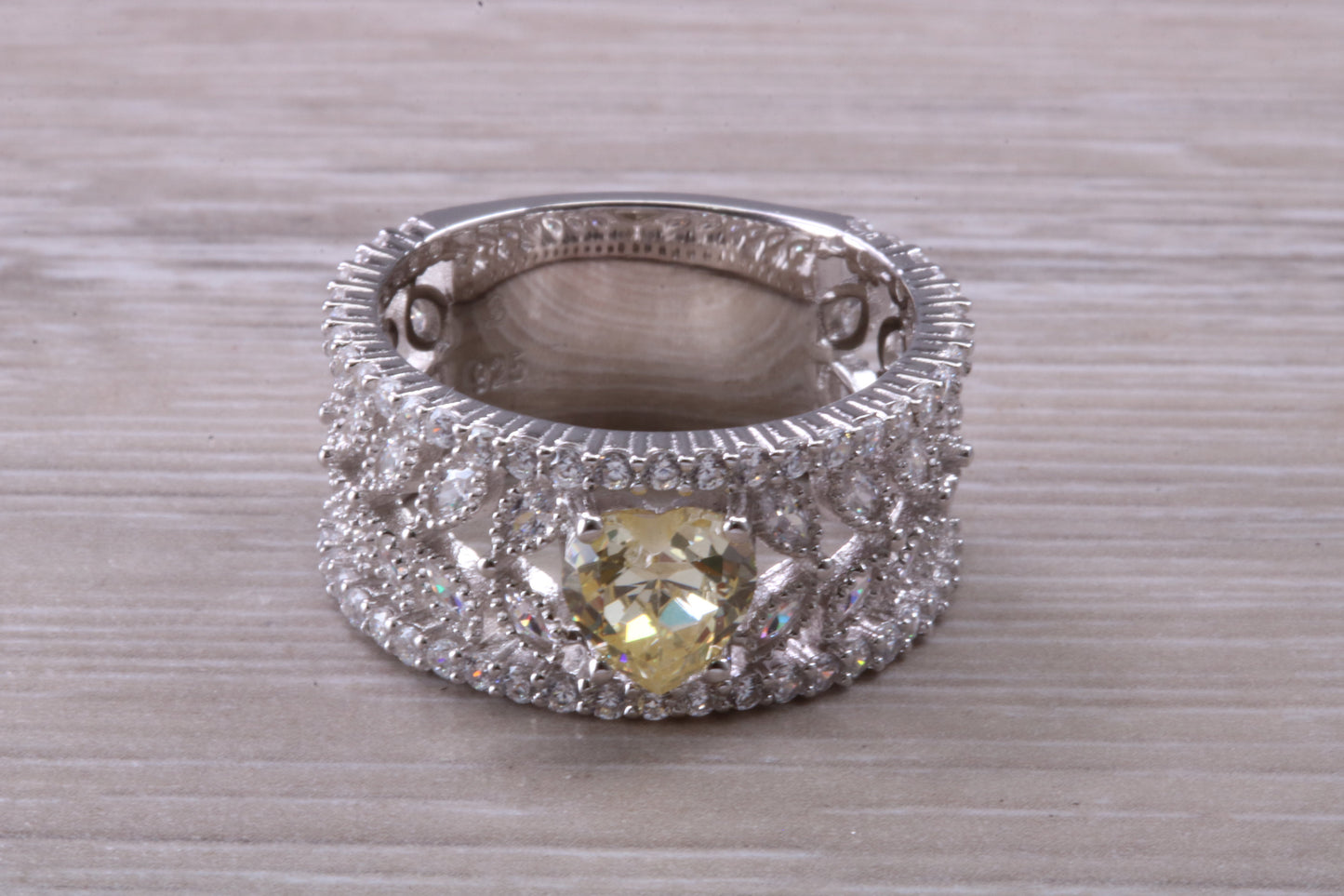 Beautiful and absolutely stunning ring, set with top grade Diamond White and Yellow C Z, Rhodium plated