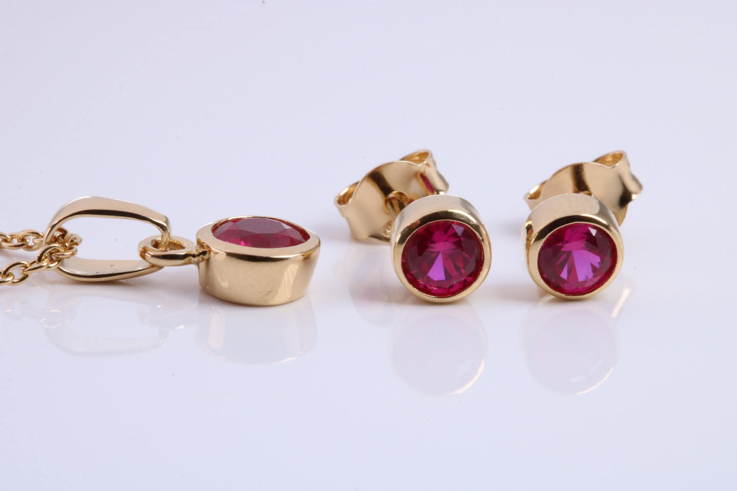 July Ruby C Z set Necklace and Matching Stud Earrings, made from solid Sterling Silver and 18ct Yellow Gold Plated