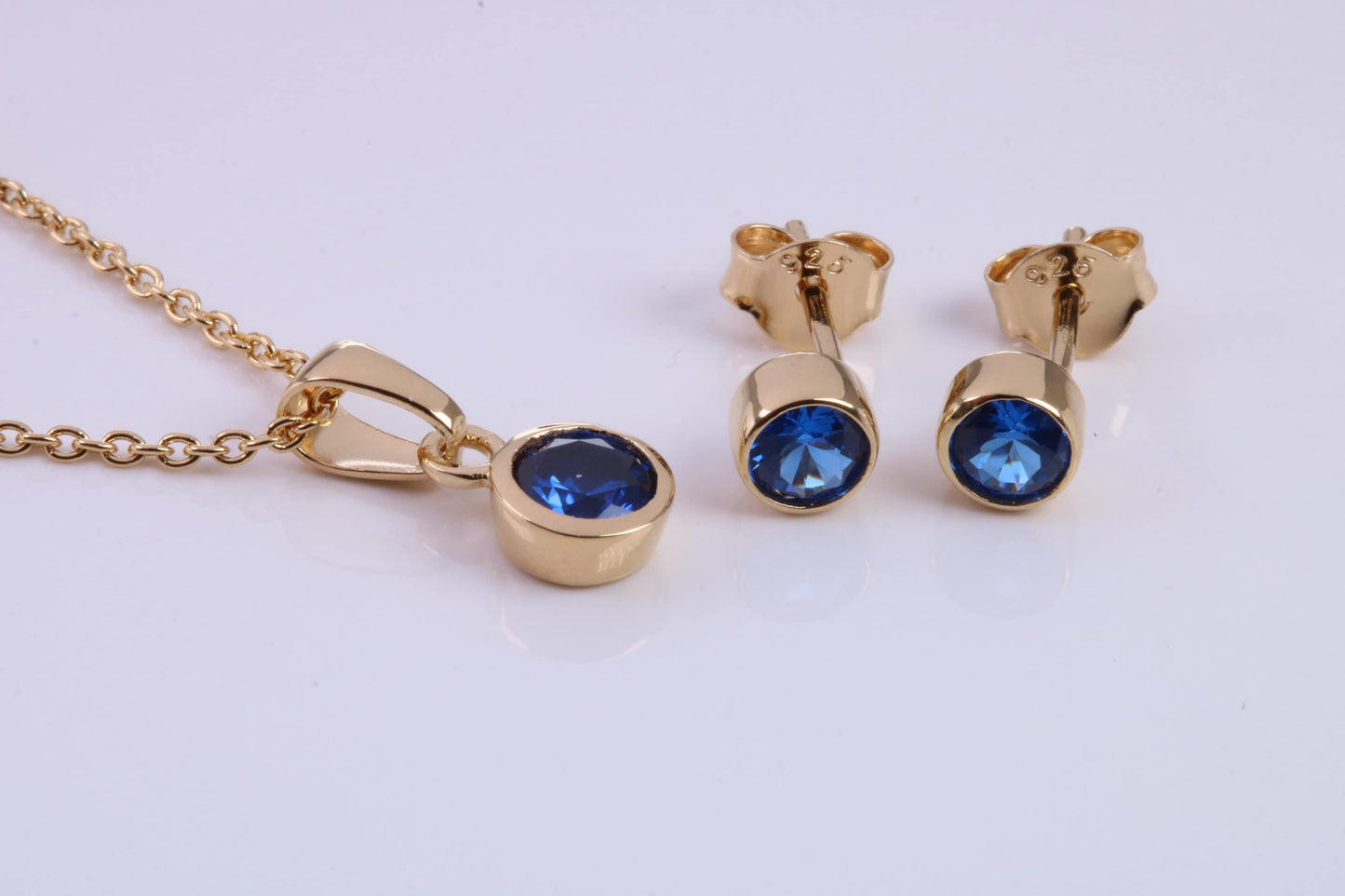 September Blue Sapphire C Z set Necklace and Matching Stud Earrings, made from solid Sterling Silver and 18ct Yellow Gold Plated