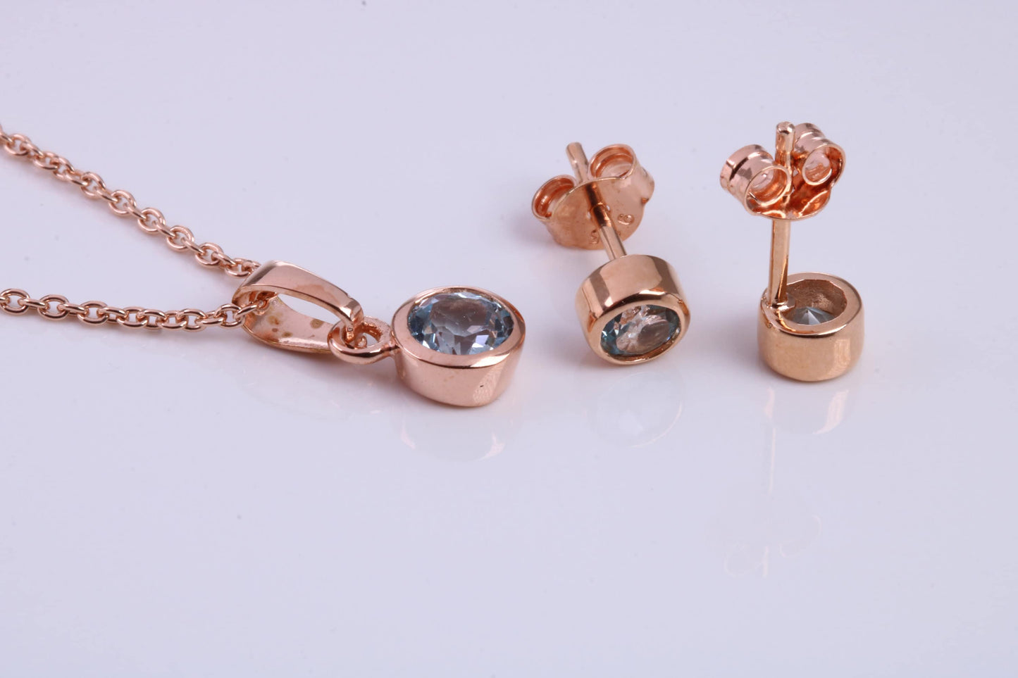 March Aquamarine C Z set Necklace and Matching Stud Earrings, made from solid Sterling Silver and 18ct Rose Gold Plated