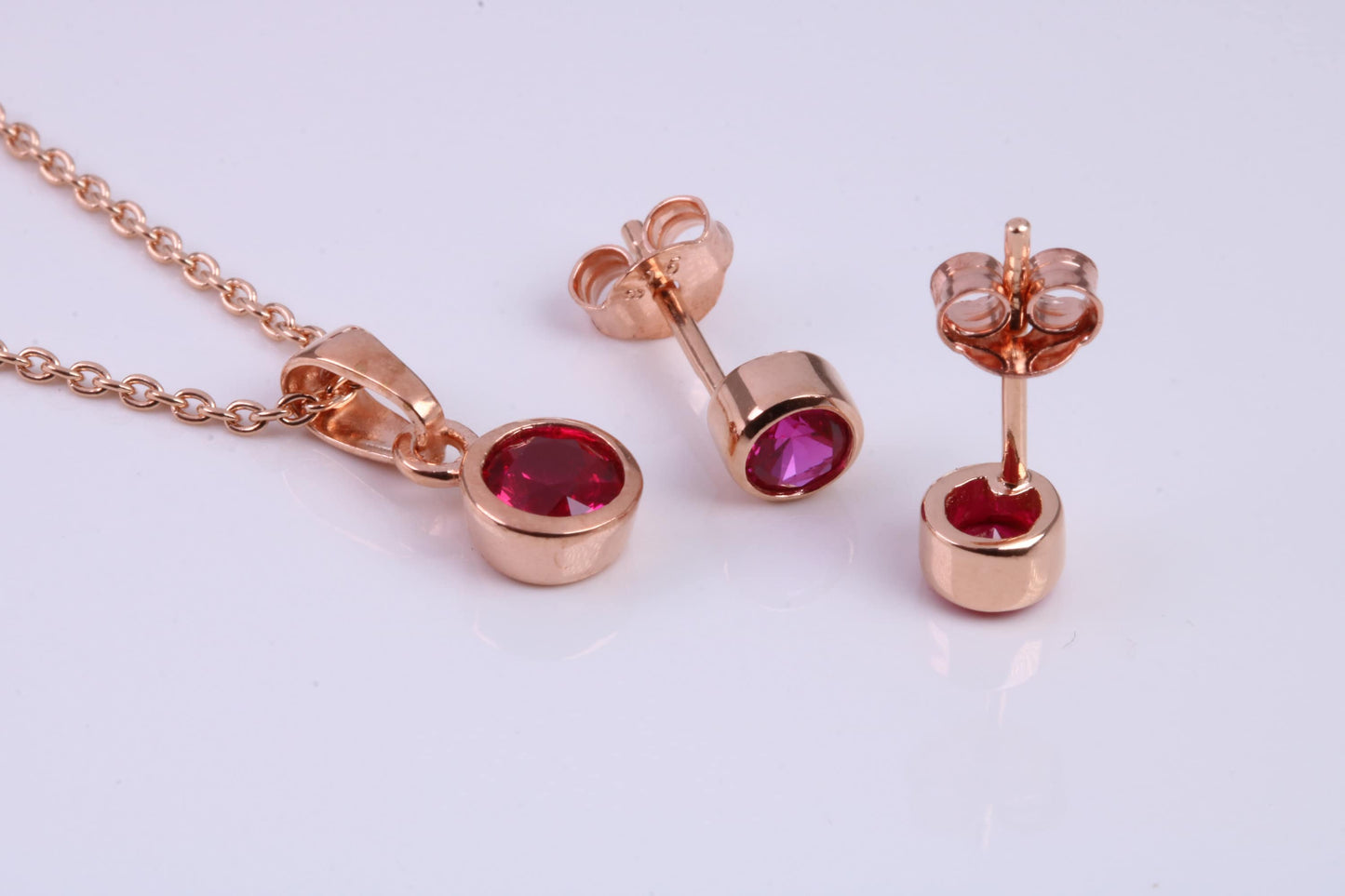 July Ruby C Z set Necklace and Matching Stud Earrings, made from solid Sterling Silver and 18ct Rose Gold Plated