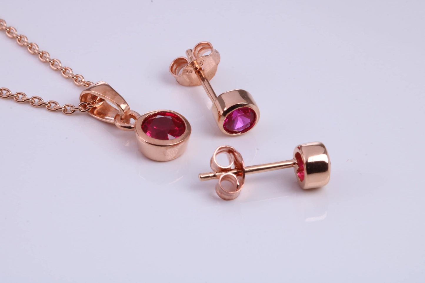 July Ruby C Z set Necklace and Matching Stud Earrings, made from solid Sterling Silver and 18ct Rose Gold Plated