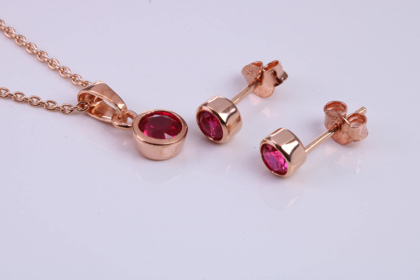 July Ruby C Z set Necklace and Matching Stud Earrings, made from solid Sterling Silver and 18ct Rose Gold Plated