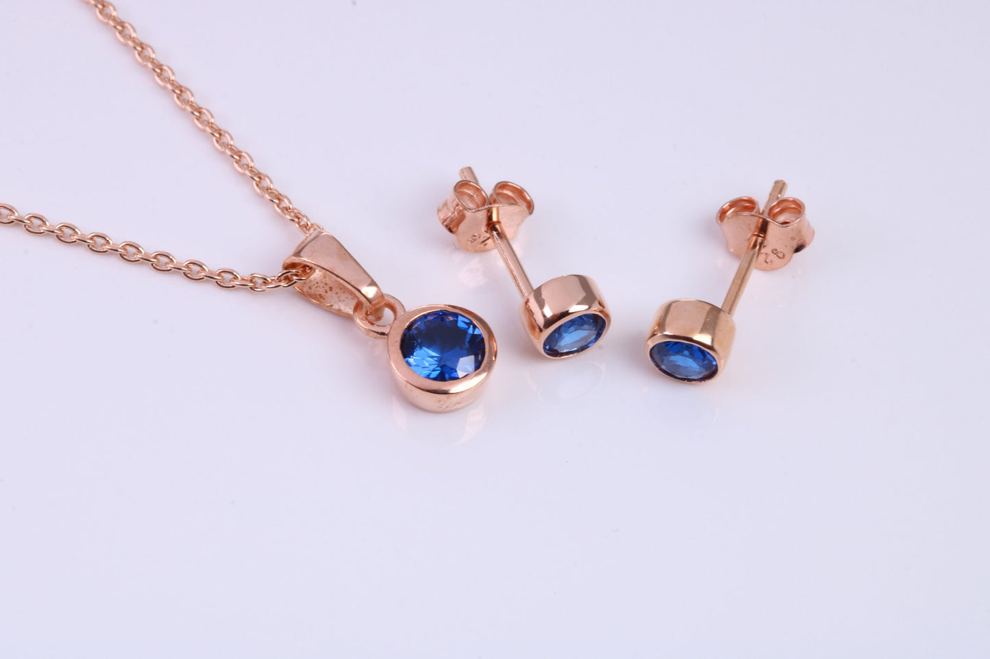 September Blue Sapphire C Z set Necklace and Matching Stud Earrings, made from solid Sterling Silver and 18ct Rose Gold Plated