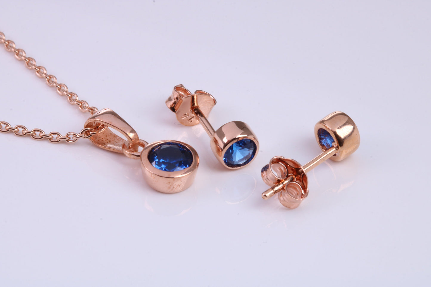September Blue Sapphire C Z set Necklace and Matching Stud Earrings, made from solid Sterling Silver and 18ct Rose Gold Plated