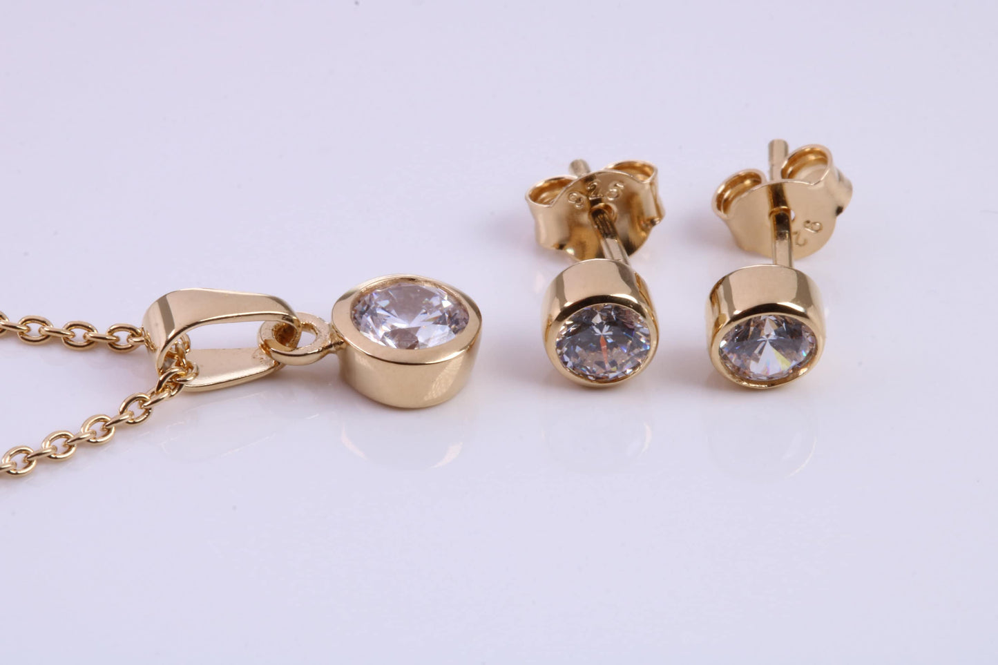 April Diamond C Z set Necklace and Matching Stud Earrings, made from solid Sterling Silver and 18ct Yellow Gold Plated