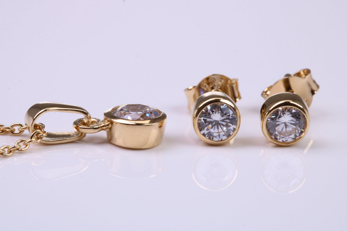April Diamond C Z set Necklace and Matching Stud Earrings, made from solid Sterling Silver and 18ct Yellow Gold Plated