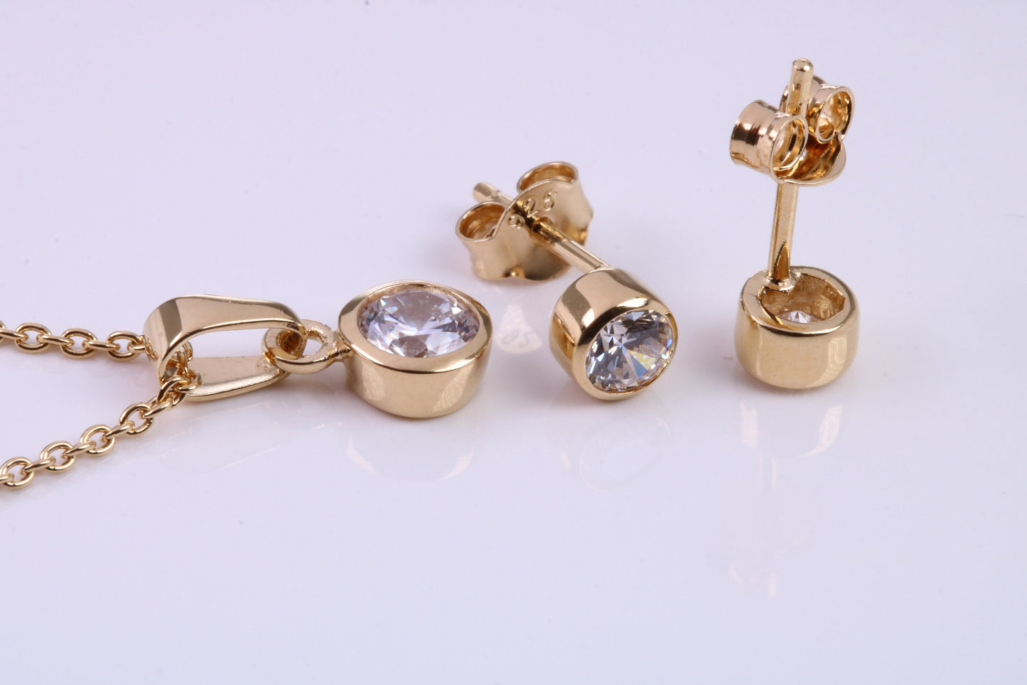 April Diamond C Z set Necklace and Matching Stud Earrings, made from solid Sterling Silver and 18ct Yellow Gold Plated