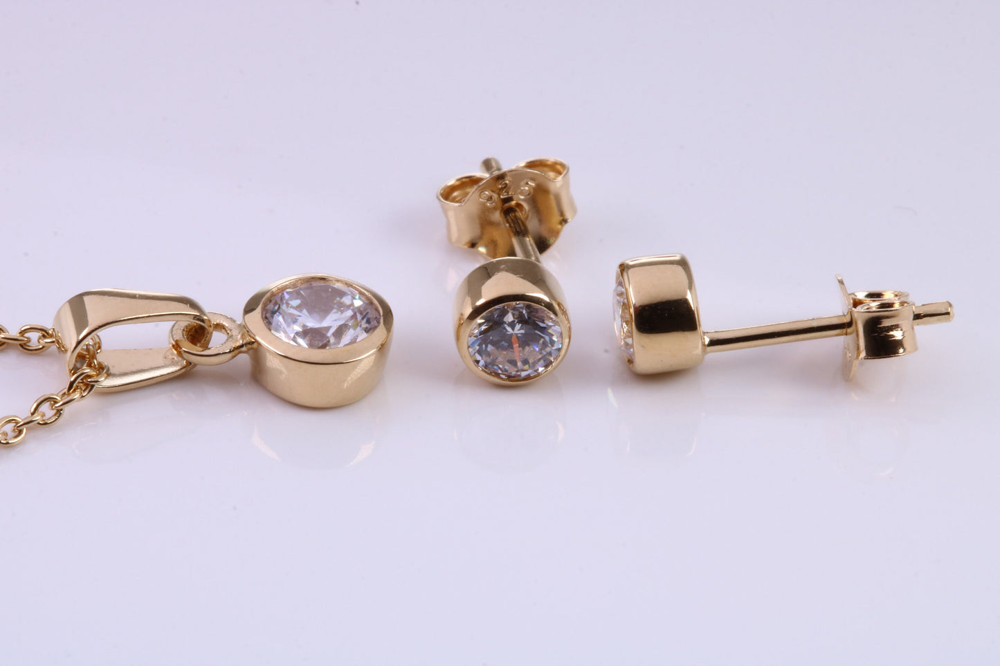 April Diamond C Z set Necklace and Matching Stud Earrings, made from solid Sterling Silver and 18ct Yellow Gold Plated