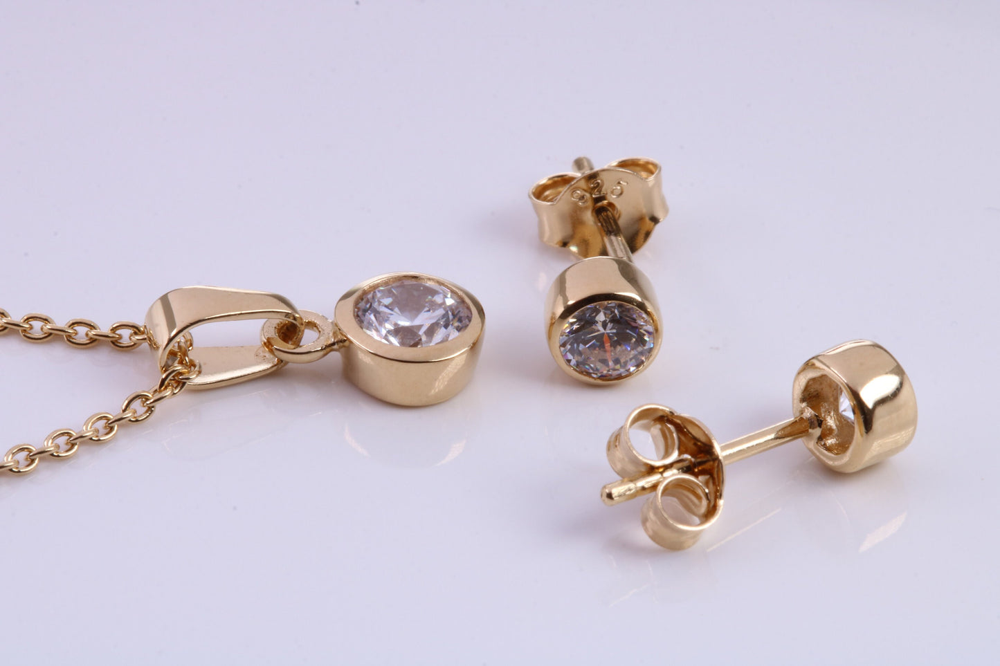 April Diamond C Z set Necklace and Matching Stud Earrings, made from solid Sterling Silver and 18ct Yellow Gold Plated