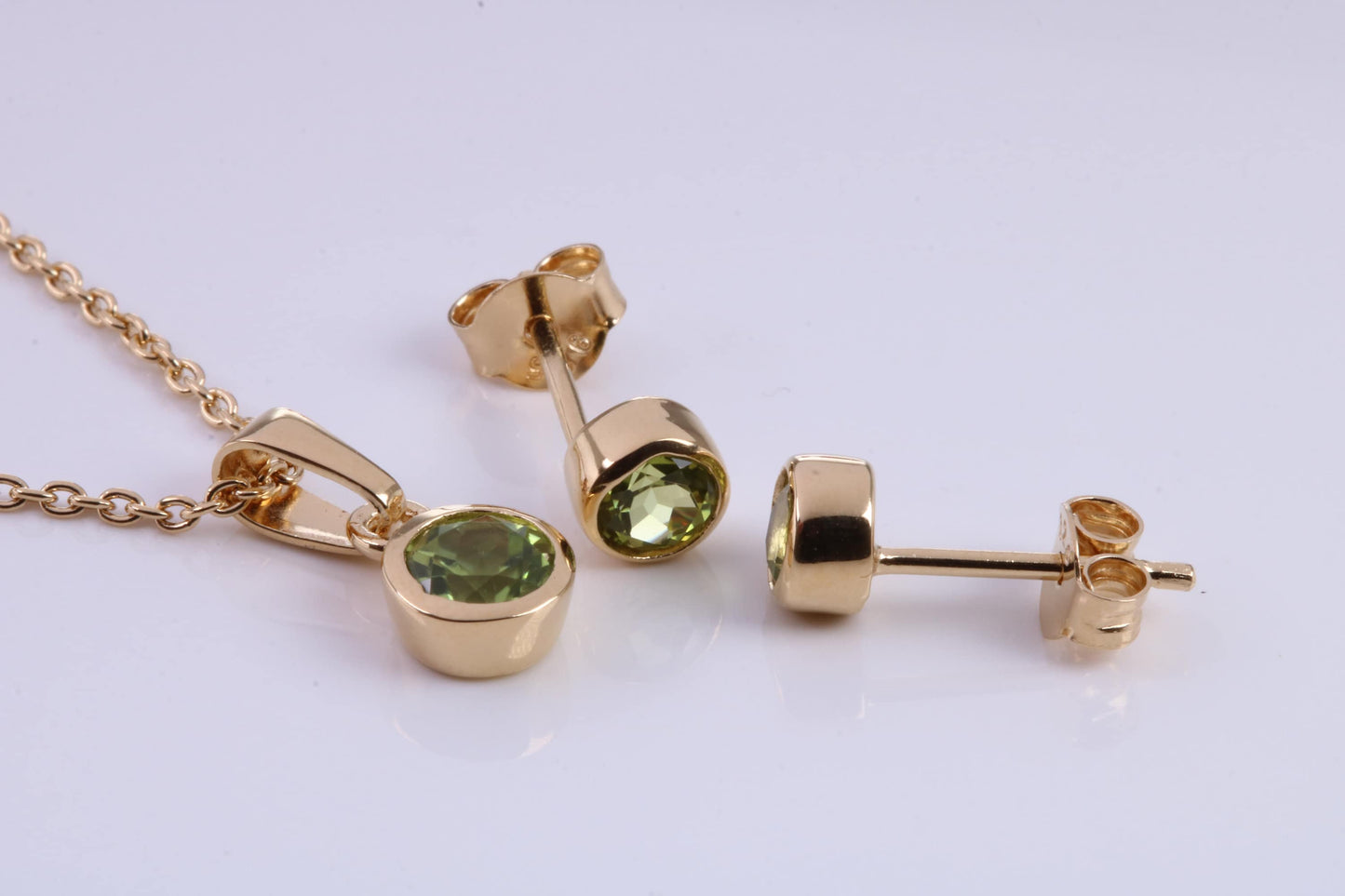 August Peridot C Z set Necklace and Matching Stud Earrings, made from solid Sterling Silver and 18ct Yellow Gold Plated