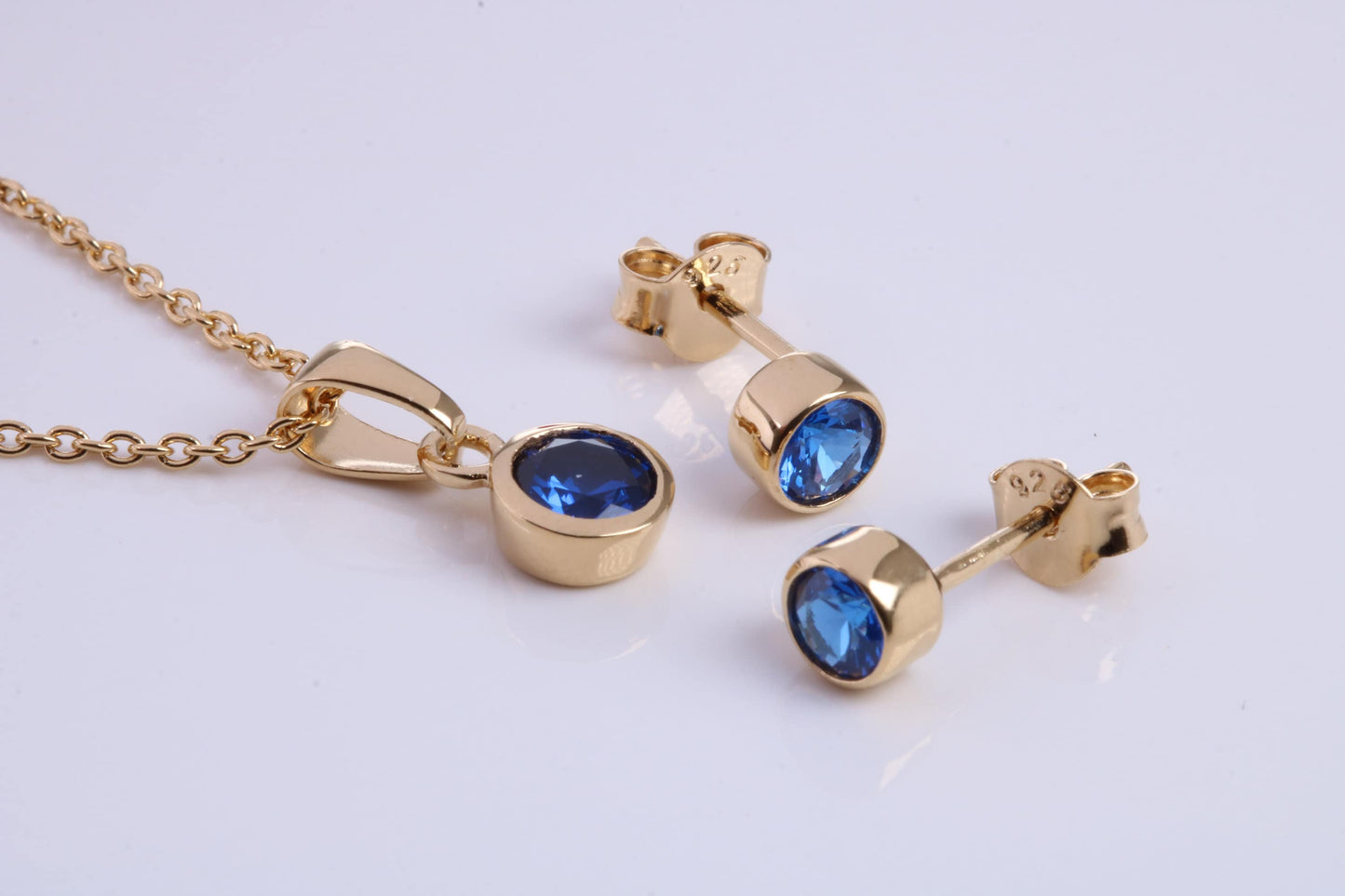 September Blue Sapphire C Z set Necklace and Matching Stud Earrings, made from solid Sterling Silver and 18ct Yellow Gold Plated