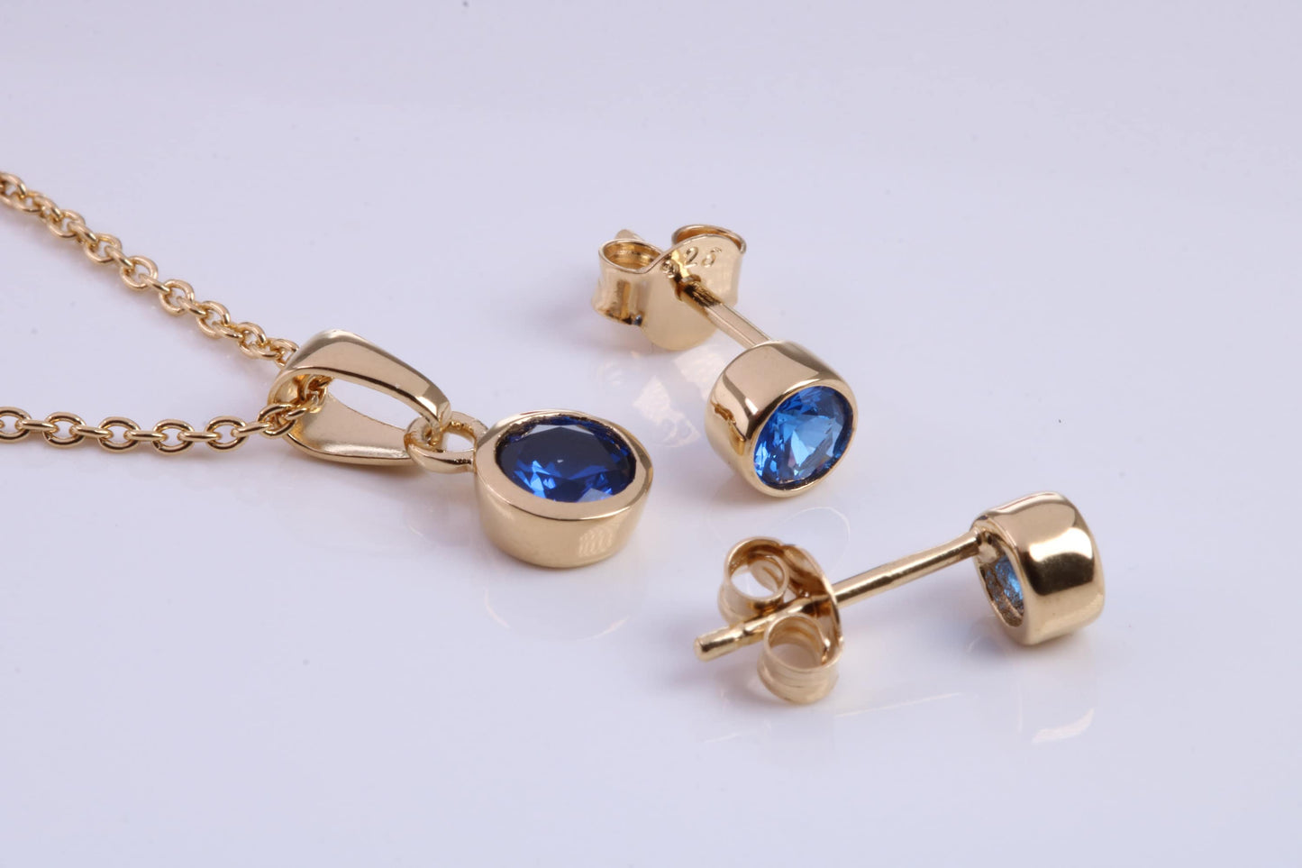 September Blue Sapphire C Z set Necklace and Matching Stud Earrings, made from solid Sterling Silver and 18ct Yellow Gold Plated