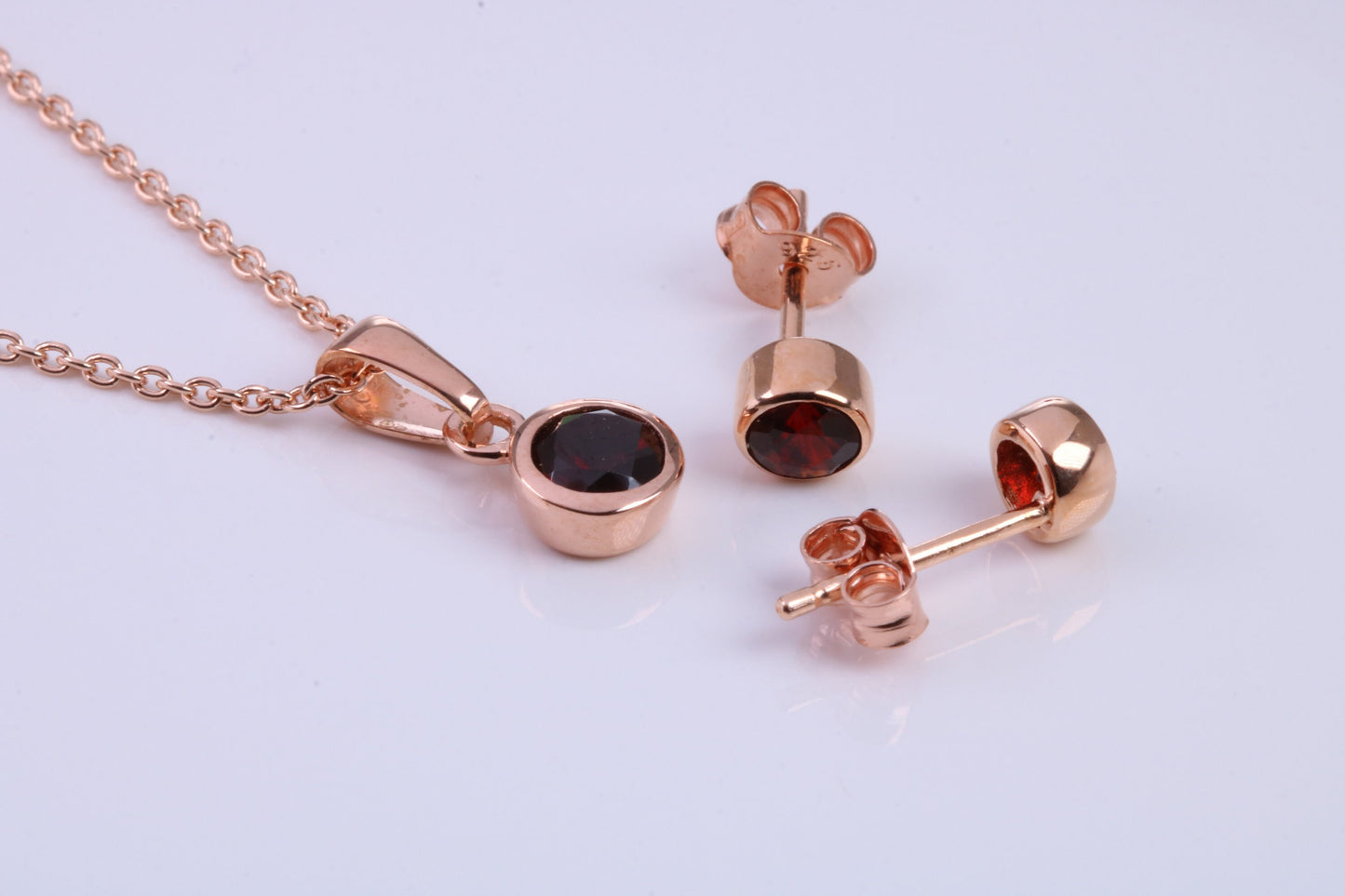 January Garnet C Z set Necklace and Matching Stud Earrings, made from solid Sterling Silver and 18ct Rose Gold Plated