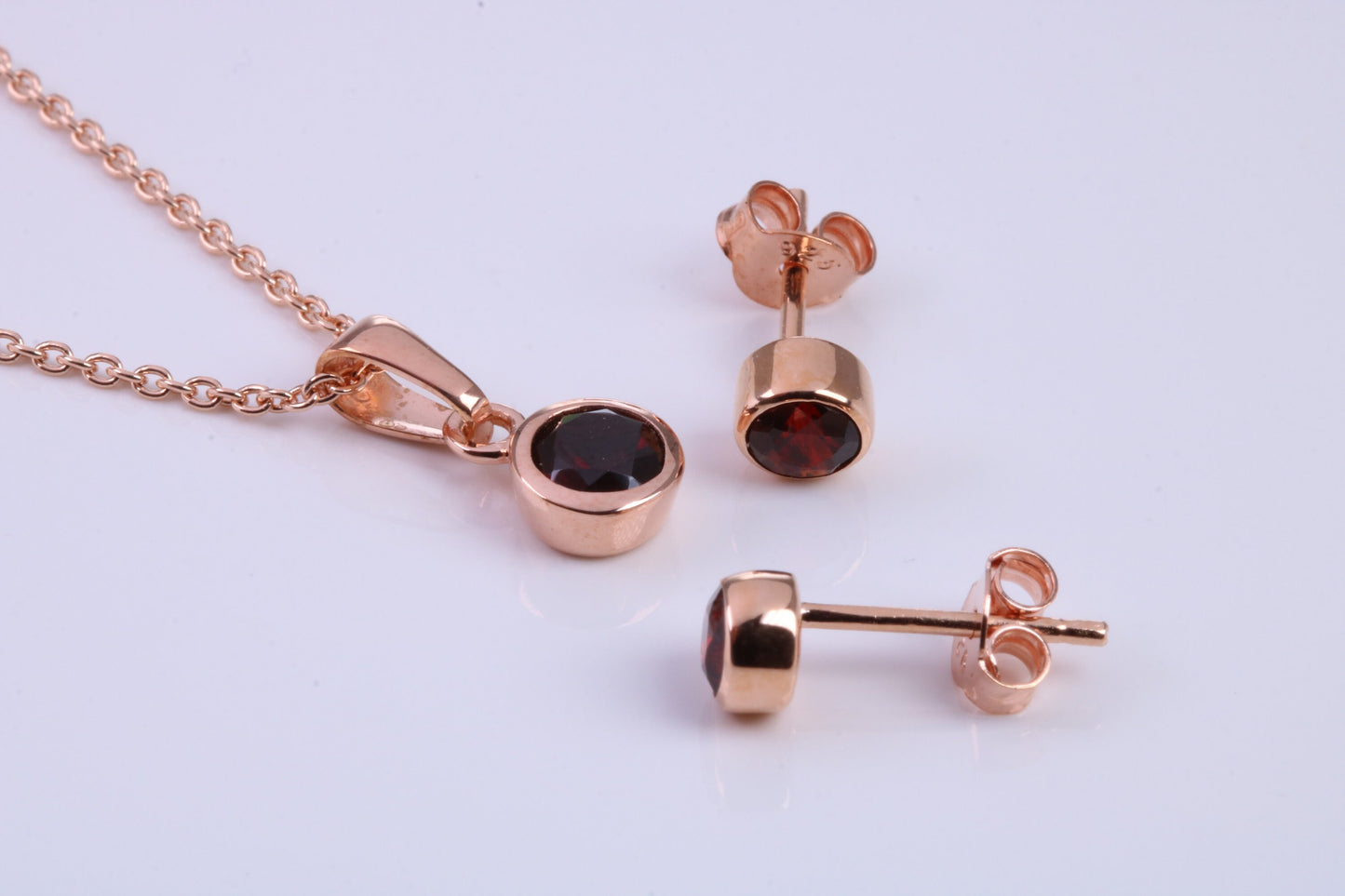 January Garnet C Z set Necklace and Matching Stud Earrings, made from solid Sterling Silver and 18ct Rose Gold Plated
