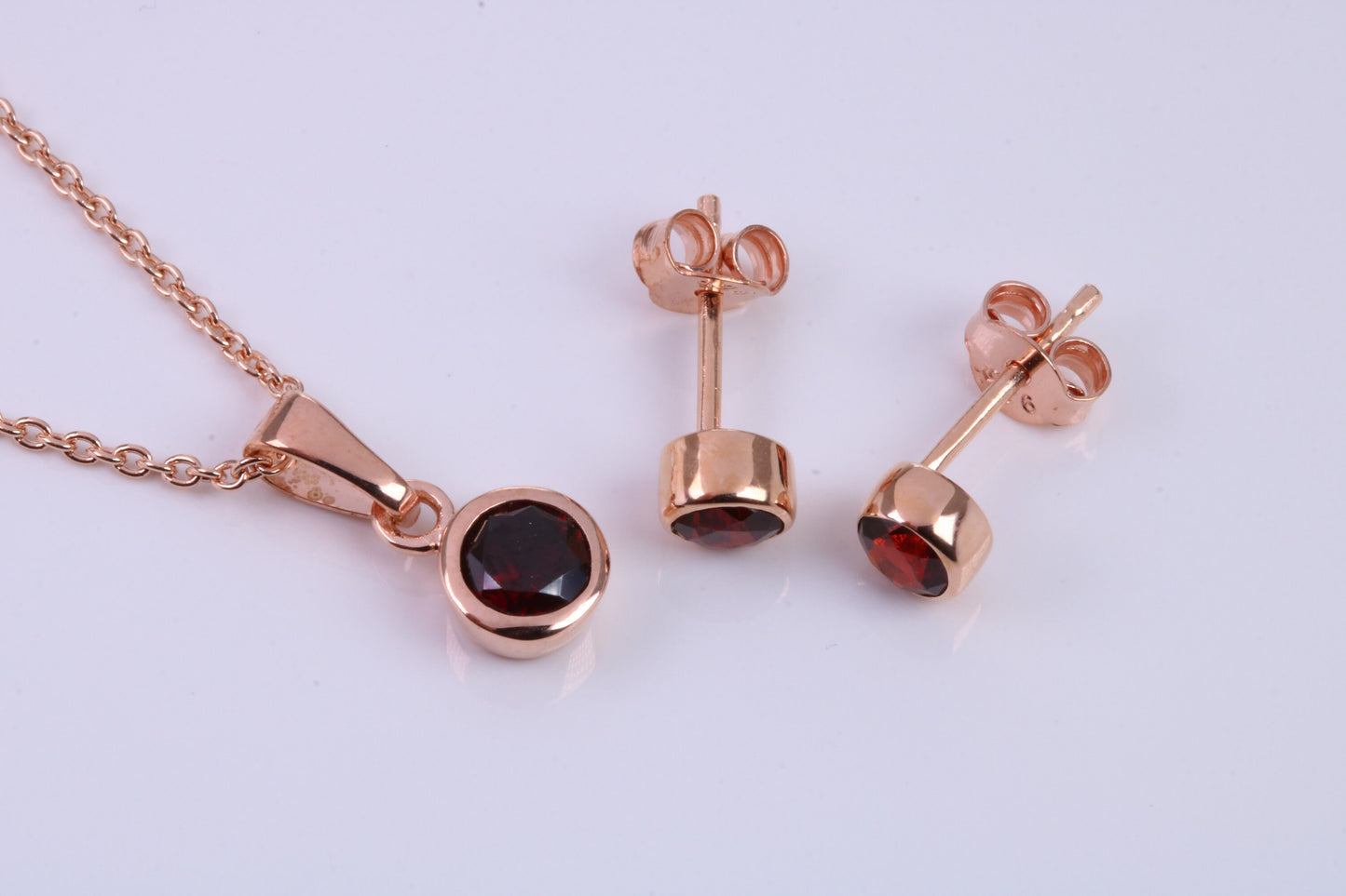 January Garnet C Z set Necklace and Matching Stud Earrings, made from solid Sterling Silver and 18ct Rose Gold Plated