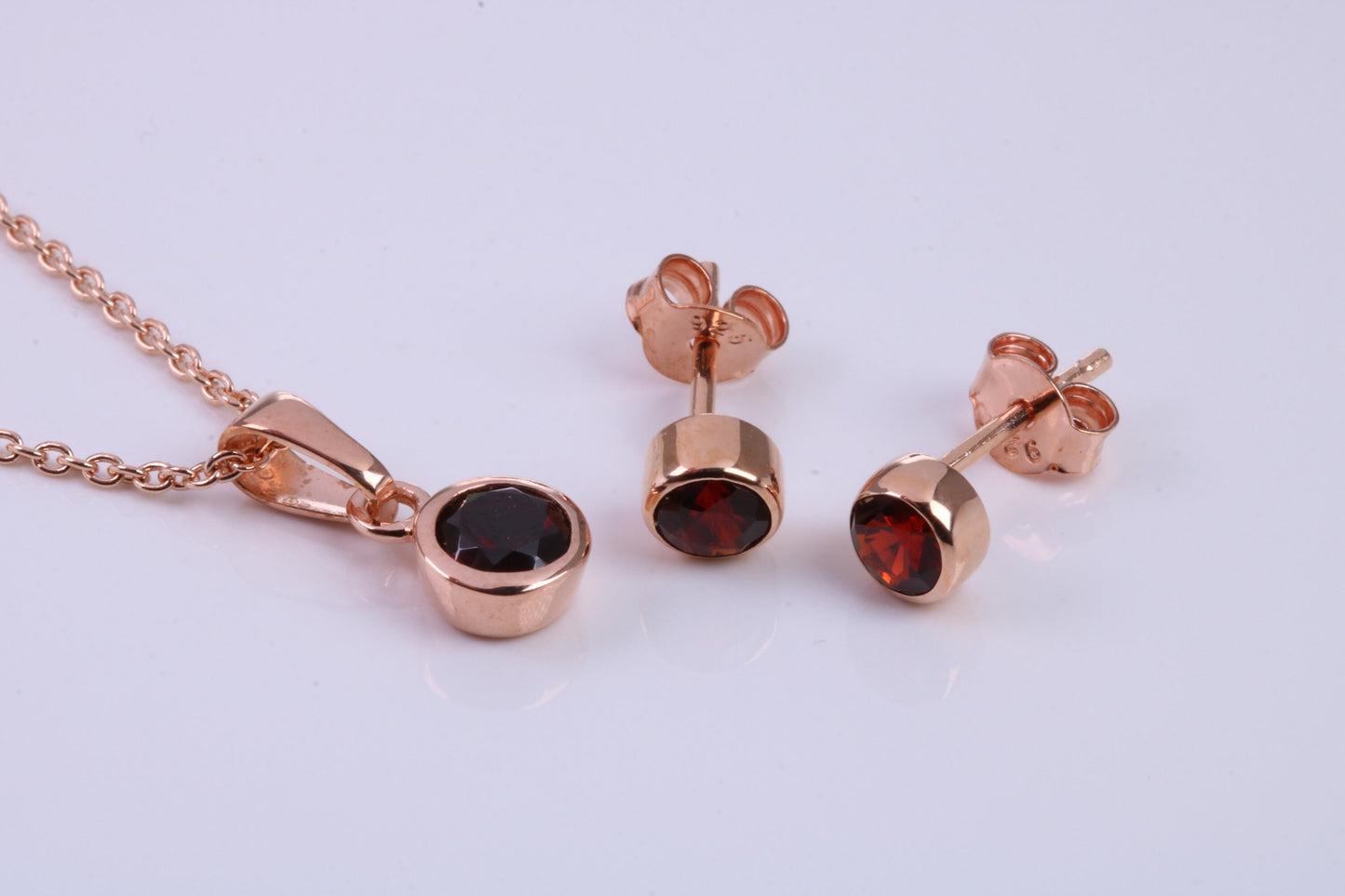 January Garnet C Z set Necklace and Matching Stud Earrings, made from solid Sterling Silver and 18ct Rose Gold Plated