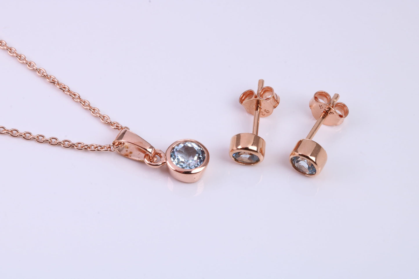 March Aquamarine C Z set Necklace and Matching Stud Earrings, made from solid Sterling Silver and 18ct Rose Gold Plated