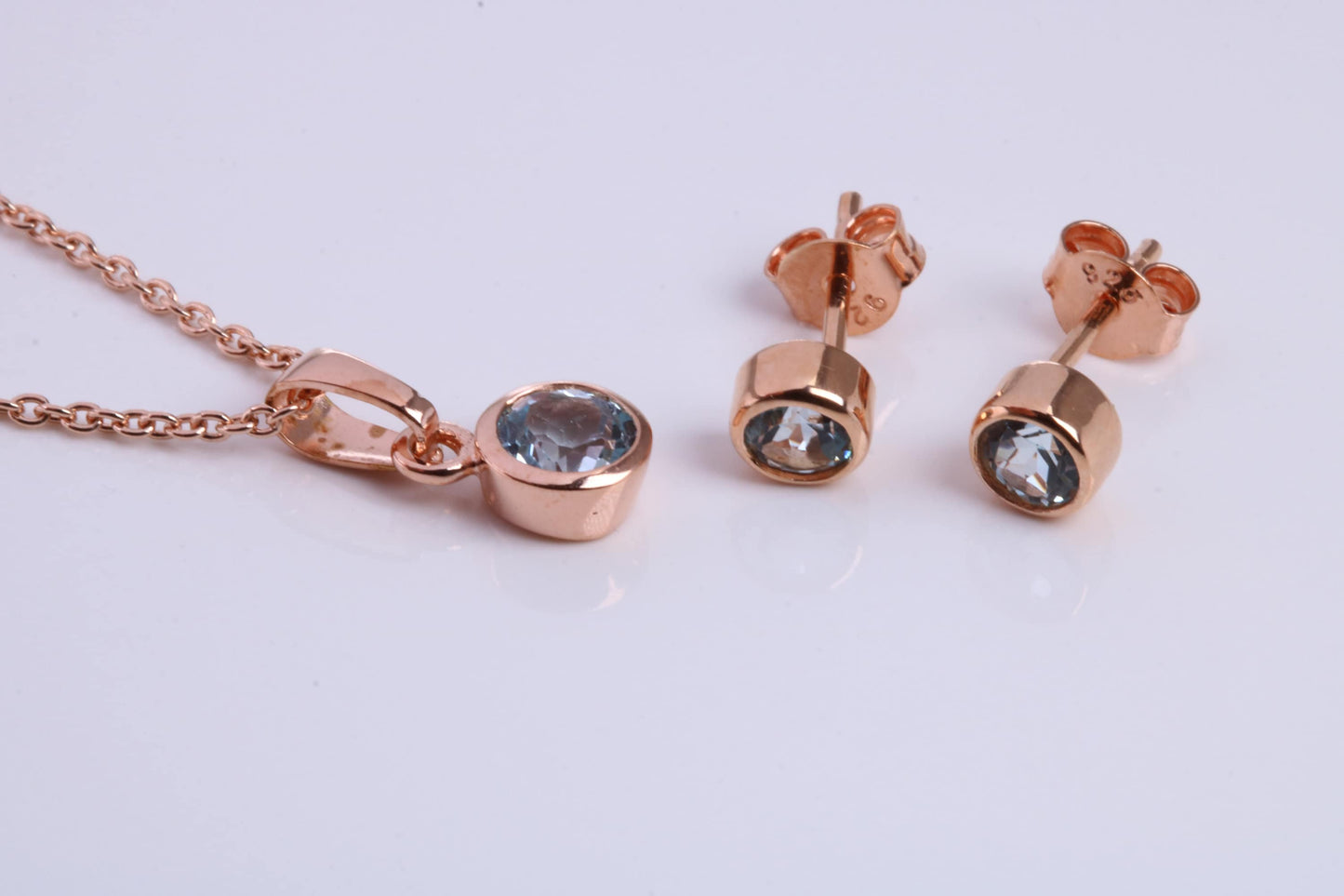 March Aquamarine C Z set Necklace and Matching Stud Earrings, made from solid Sterling Silver and 18ct Rose Gold Plated