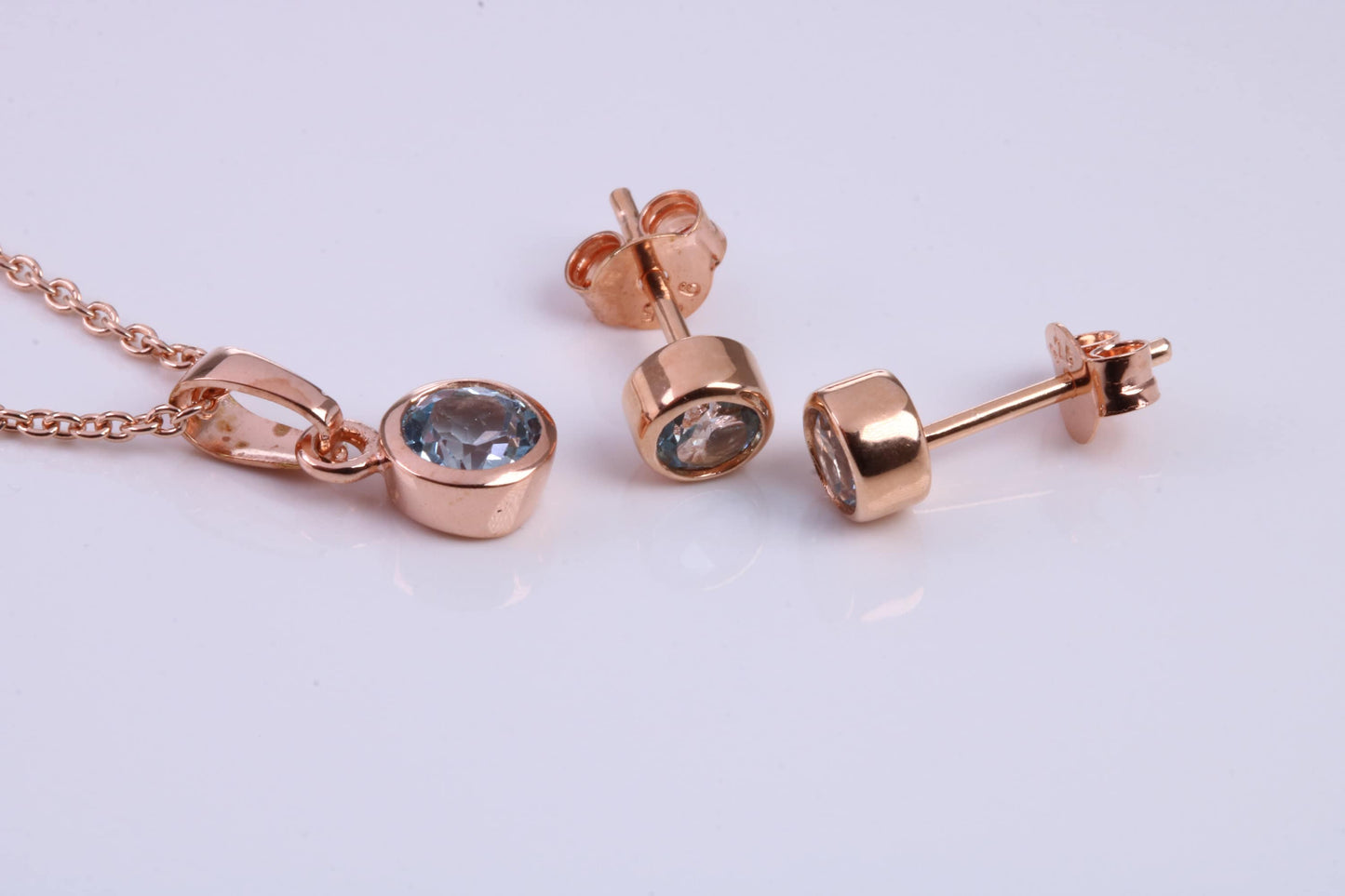 March Aquamarine C Z set Necklace and Matching Stud Earrings, made from solid Sterling Silver and 18ct Rose Gold Plated
