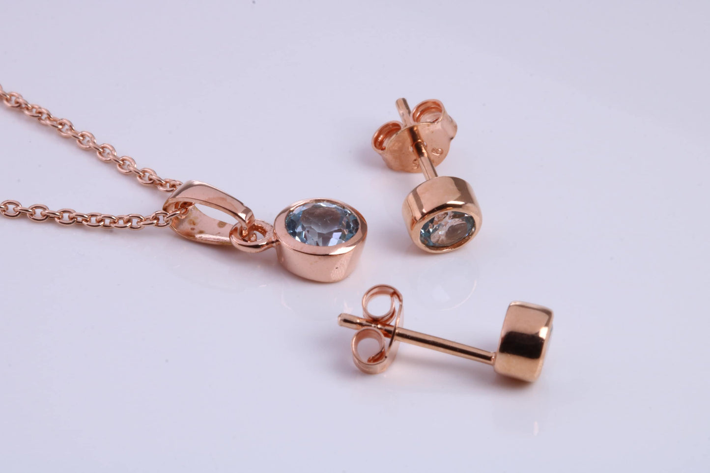 March Aquamarine C Z set Necklace and Matching Stud Earrings, made from solid Sterling Silver and 18ct Rose Gold Plated