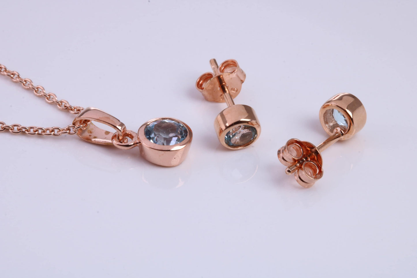 March Aquamarine C Z set Necklace and Matching Stud Earrings, made from solid Sterling Silver and 18ct Rose Gold Plated