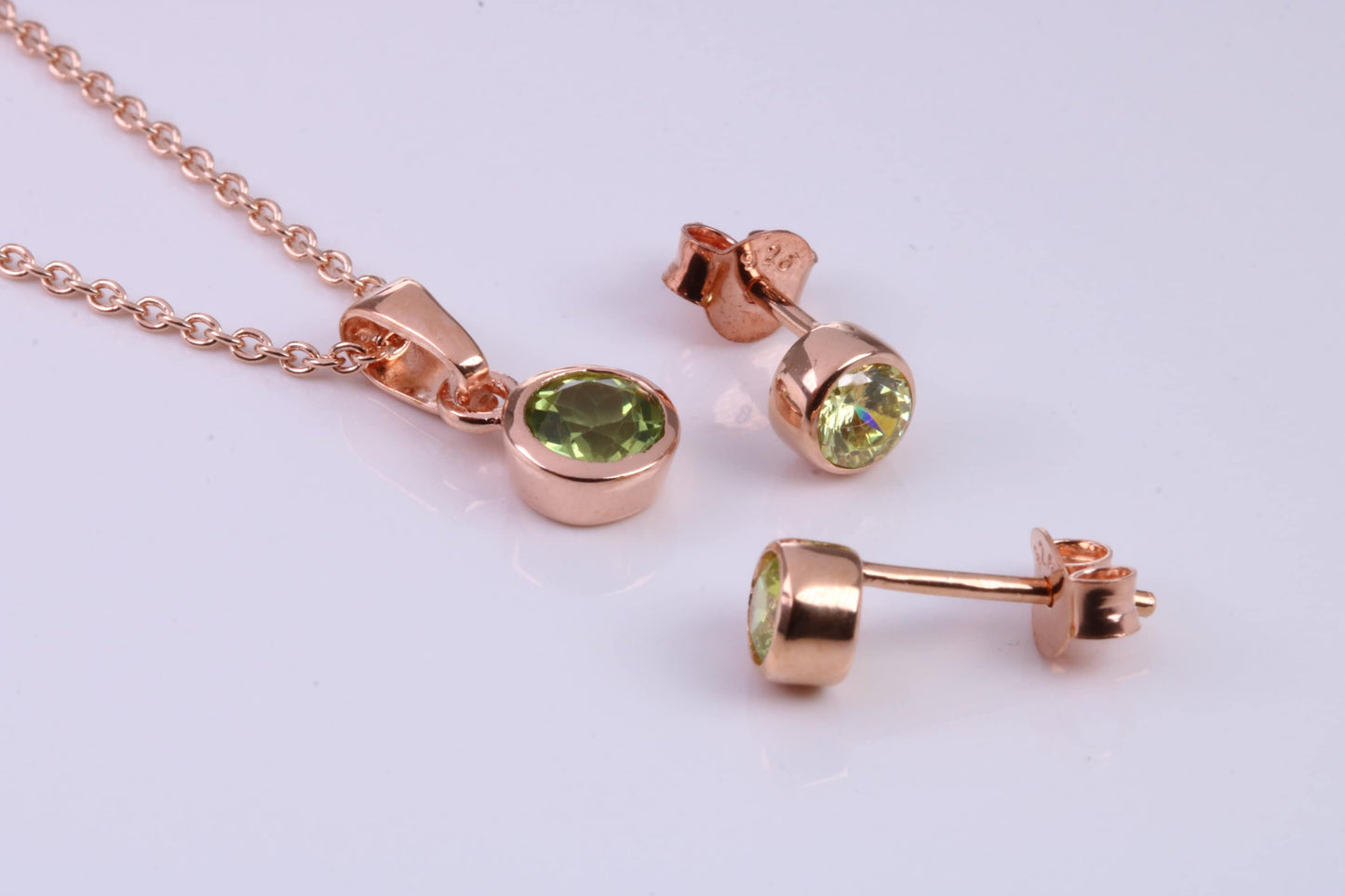 August Peridot C Z set Necklace and Matching Stud Earrings, made from solid Sterling Silver and 18ct Rose Gold Plated