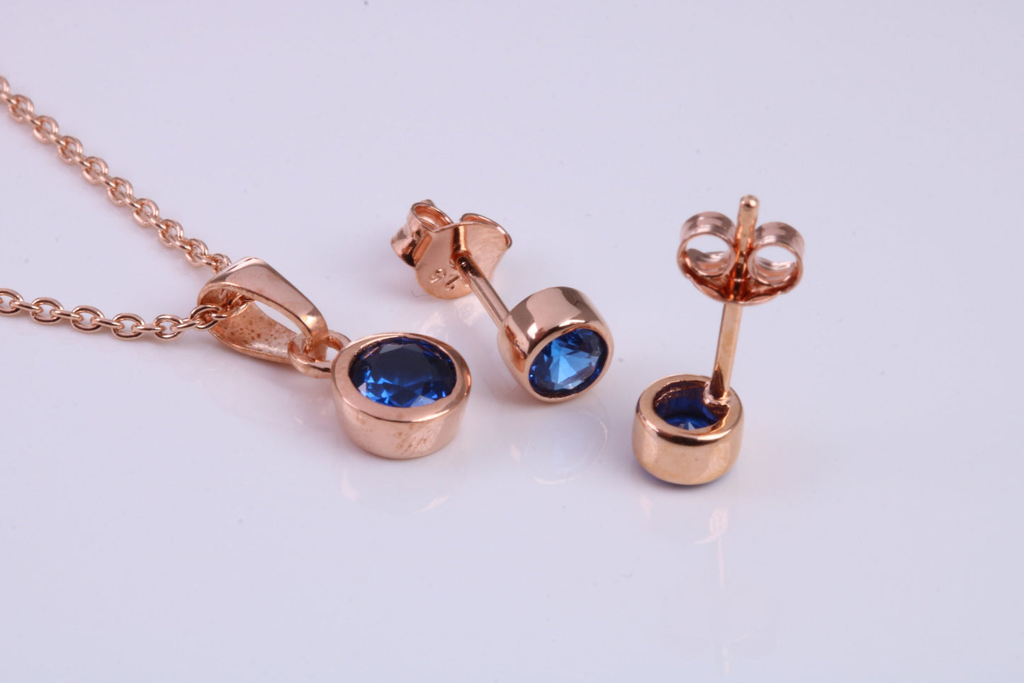 September Blue Sapphire C Z set Necklace and Matching Stud Earrings, made from solid Sterling Silver and 18ct Rose Gold Plated