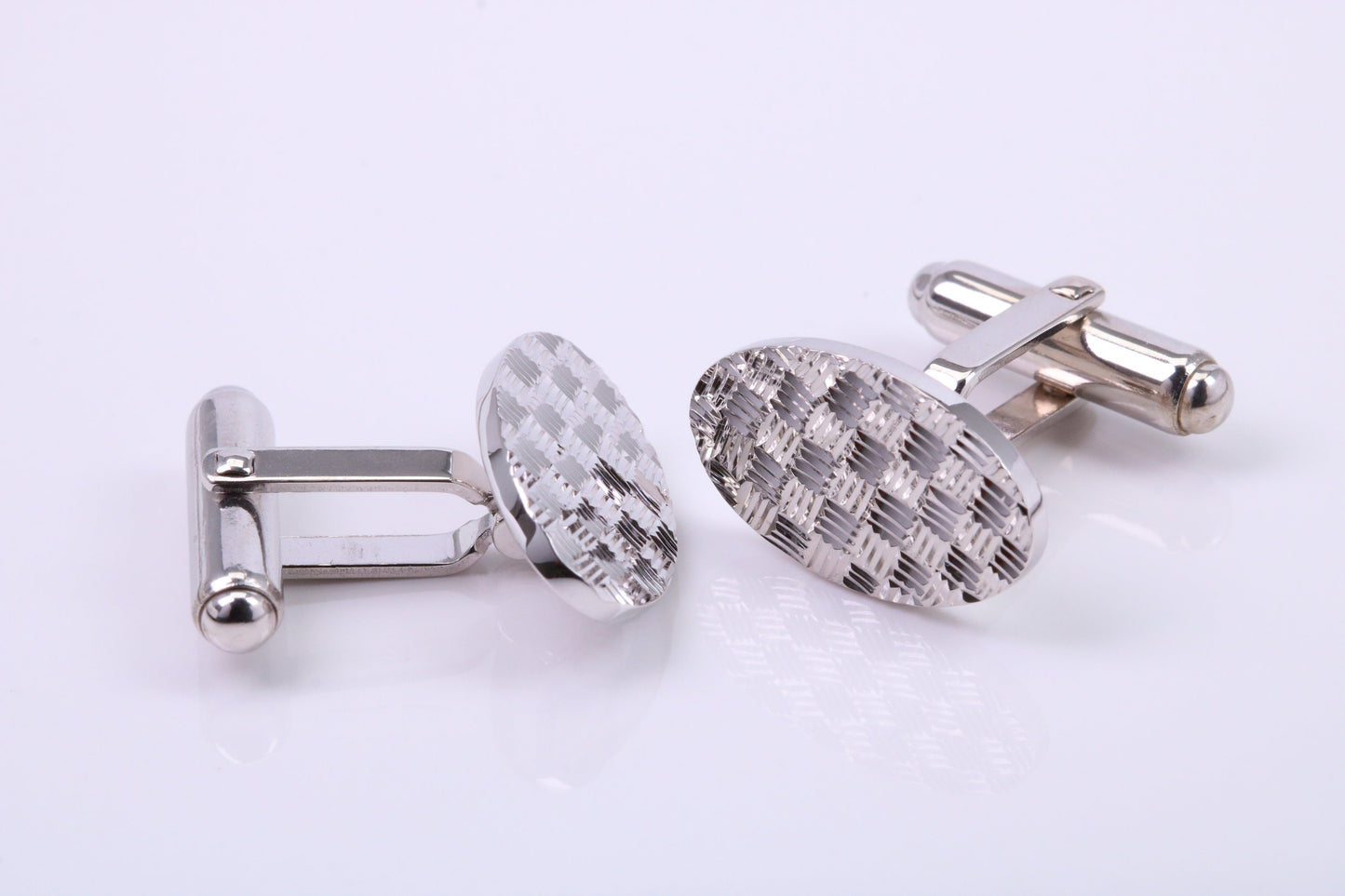 Machine Patterned Oval Shaped Solid Silver Cufflinks