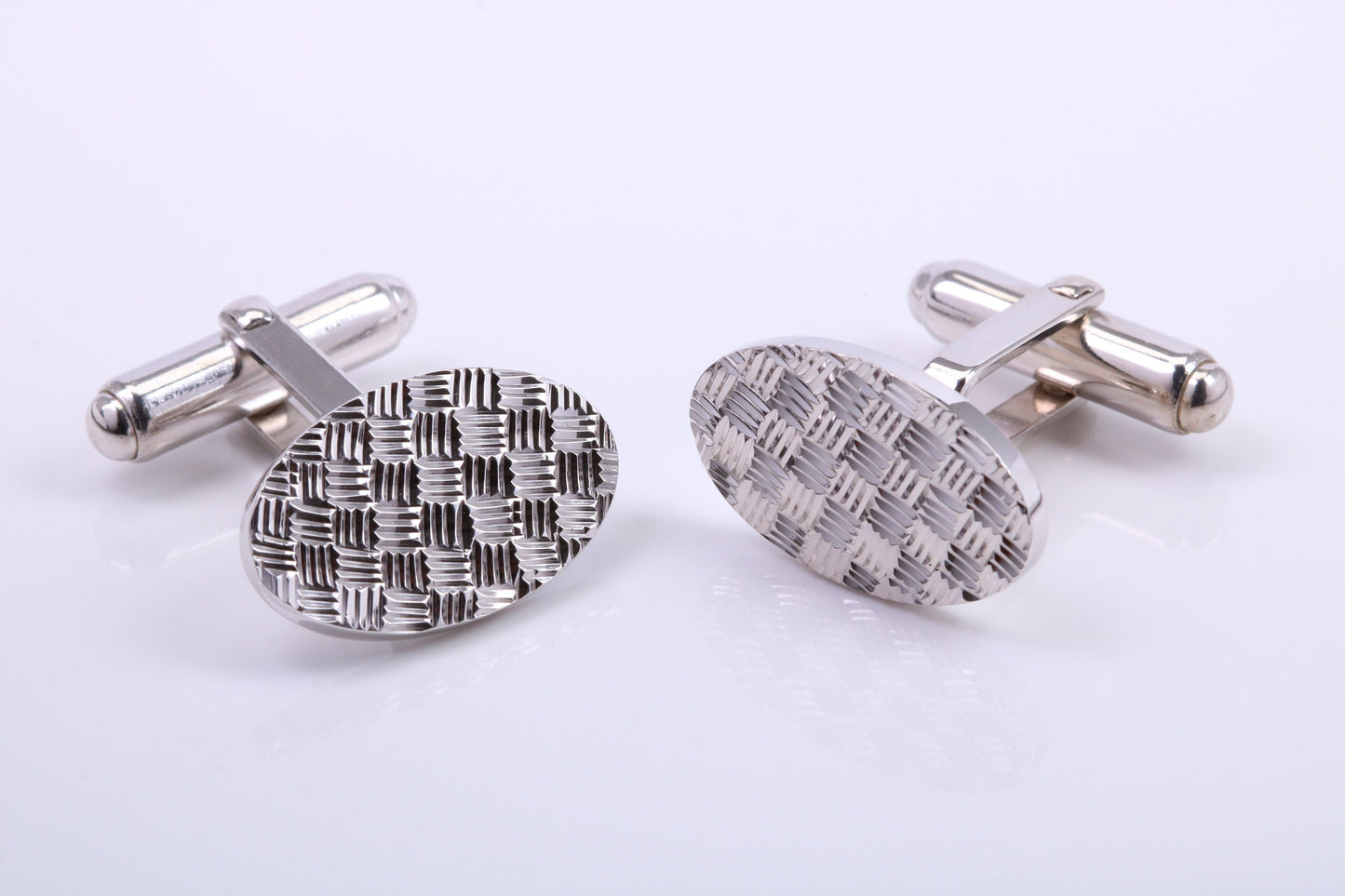 Machine Patterned Oval Shaped Solid Silver Cufflinks