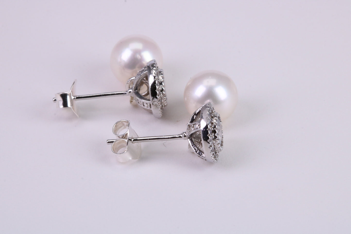 Natural 8 mm Round Pearl and Cubic Zirconia set Stud Earrings set in Solid Silver