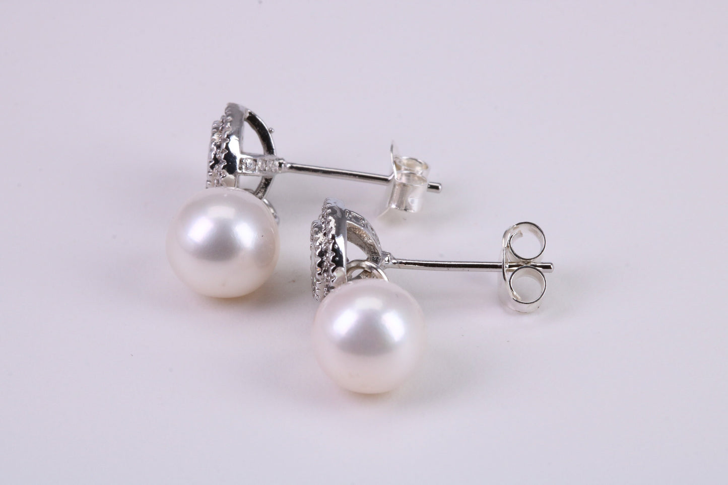 Natural 8 mm Round Pearl and Cubic Zirconia set Stud Earrings set in Solid Silver