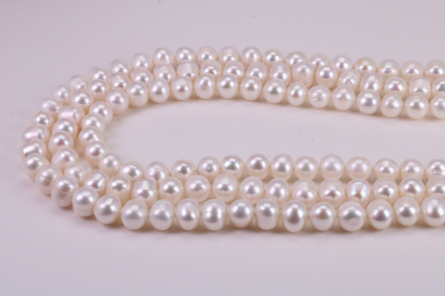 Three Strand Natural 7 mm Round Pearl Necklace set in Silver, Three Strands Measures 16, 18 and 20 inches Long