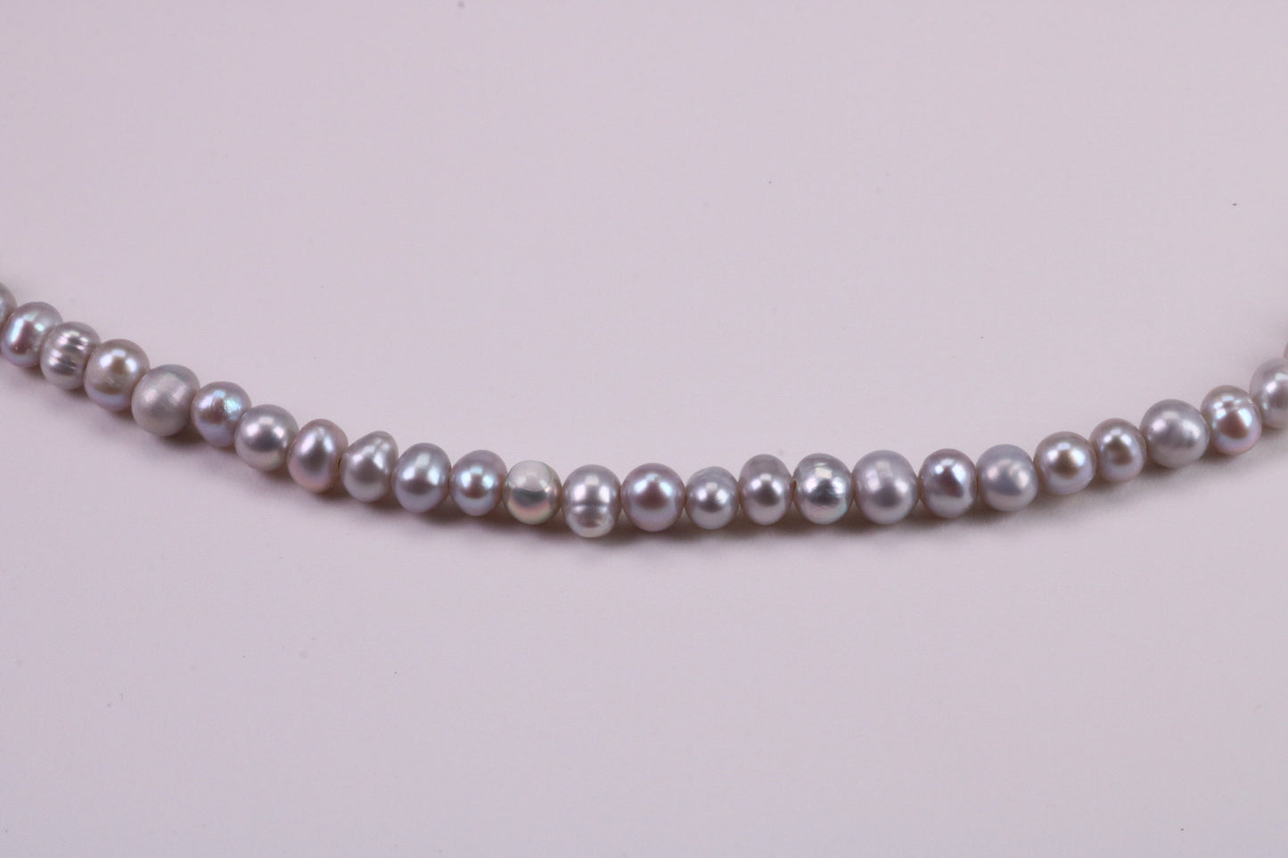 16 Inches Long Single Strand Natural 5 mm Round Grey Pearl Necklace set in Silver