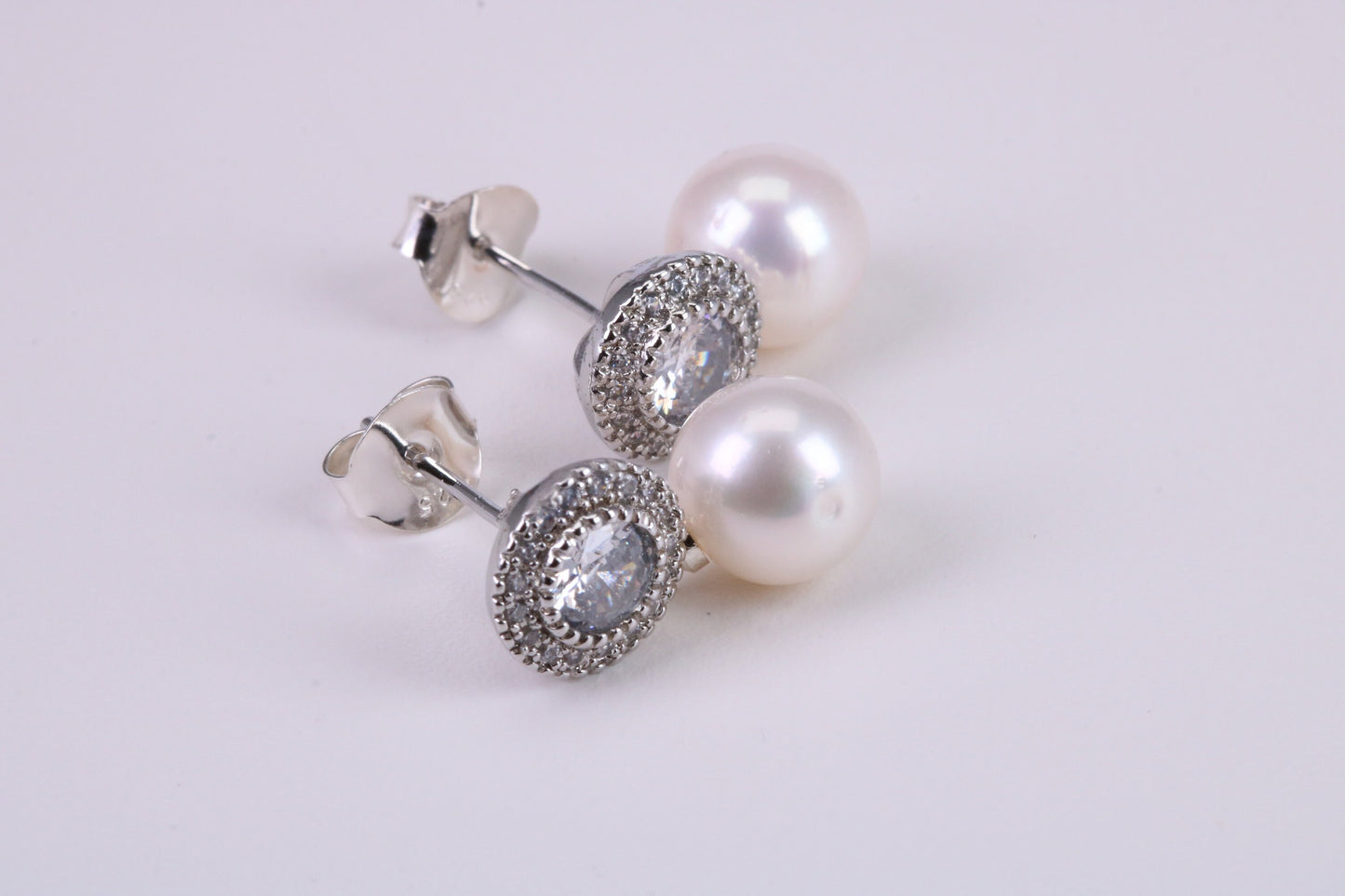Natural 8 mm Round Pearl and Cubic Zirconia set Stud Earrings set in Solid Silver