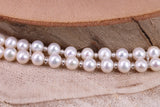 Double Row Freshwater Pearl Bracelet with Rose Flower Closure, made from Sterling Silver