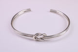 Knotted Open End Oval Solid Silver Bangle