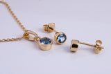 December Blue Zircon C Z set Necklace and Matching Stud Earrings, made from solid Sterling Silver and 18ct Yellow Gold Plated