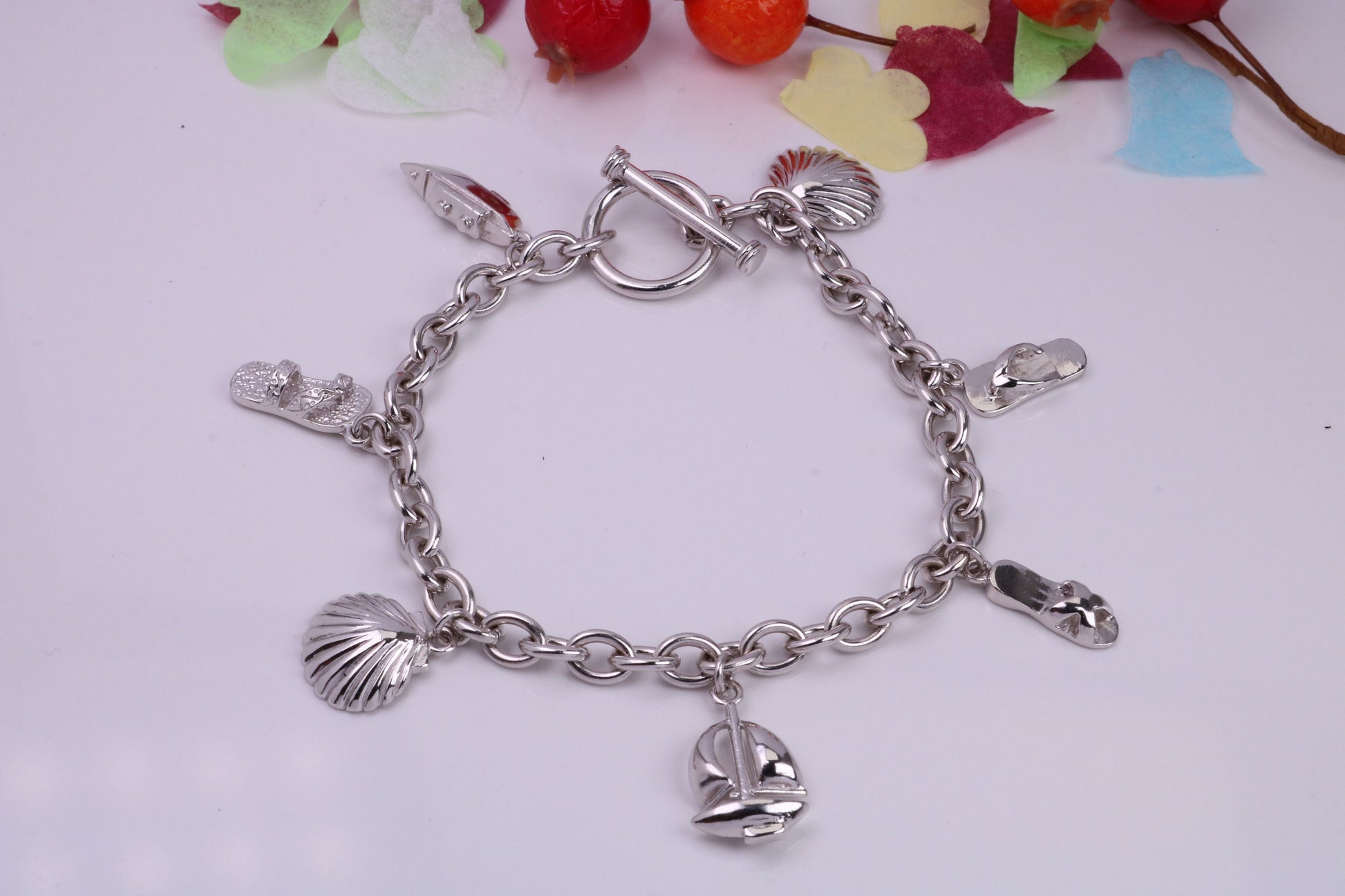 Ready to Wear Charms Bracelet, With Seven Charms Attached, Made from solid Sterling Silver, 7.50 Inches Long, Good Weighty Feel