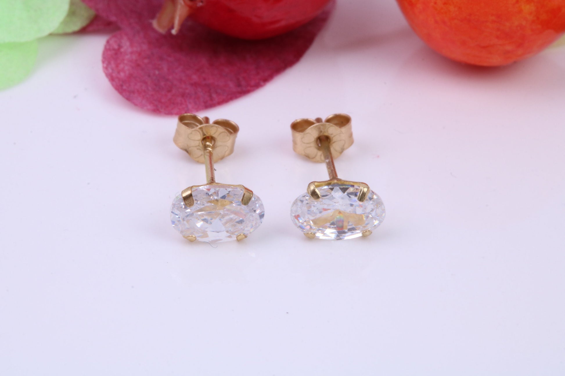 Small Oval cut Cubic Zirconia set Stud Earrings, Measures 5 x 3 mm, Made from Solid 9ct Yellow Gold