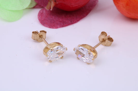 Basket set Oval cut Cubic Zirconia set Stud Earrings, Measures 6 x 4 mm, Made from Solid 9ct Yellow Gold