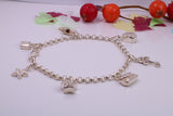 Charms Bracelet, Ready to Wear with Seven C Z set Charms, made from solid Sterling Silver, 7.50 Inches Long