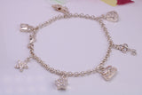 Charms Bracelet, Ready to Wear with Seven C Z set Charms, made from solid Sterling Silver, 7.50 Inches Long