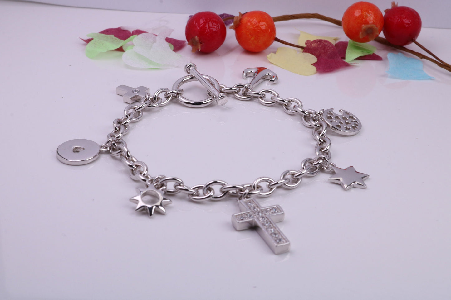 Ready to Wear Charms Bracelet, With Seven C Z set Charms Attached, Made from solid Sterling Silver, 7.50 Inches Long, Good Weighty Feel